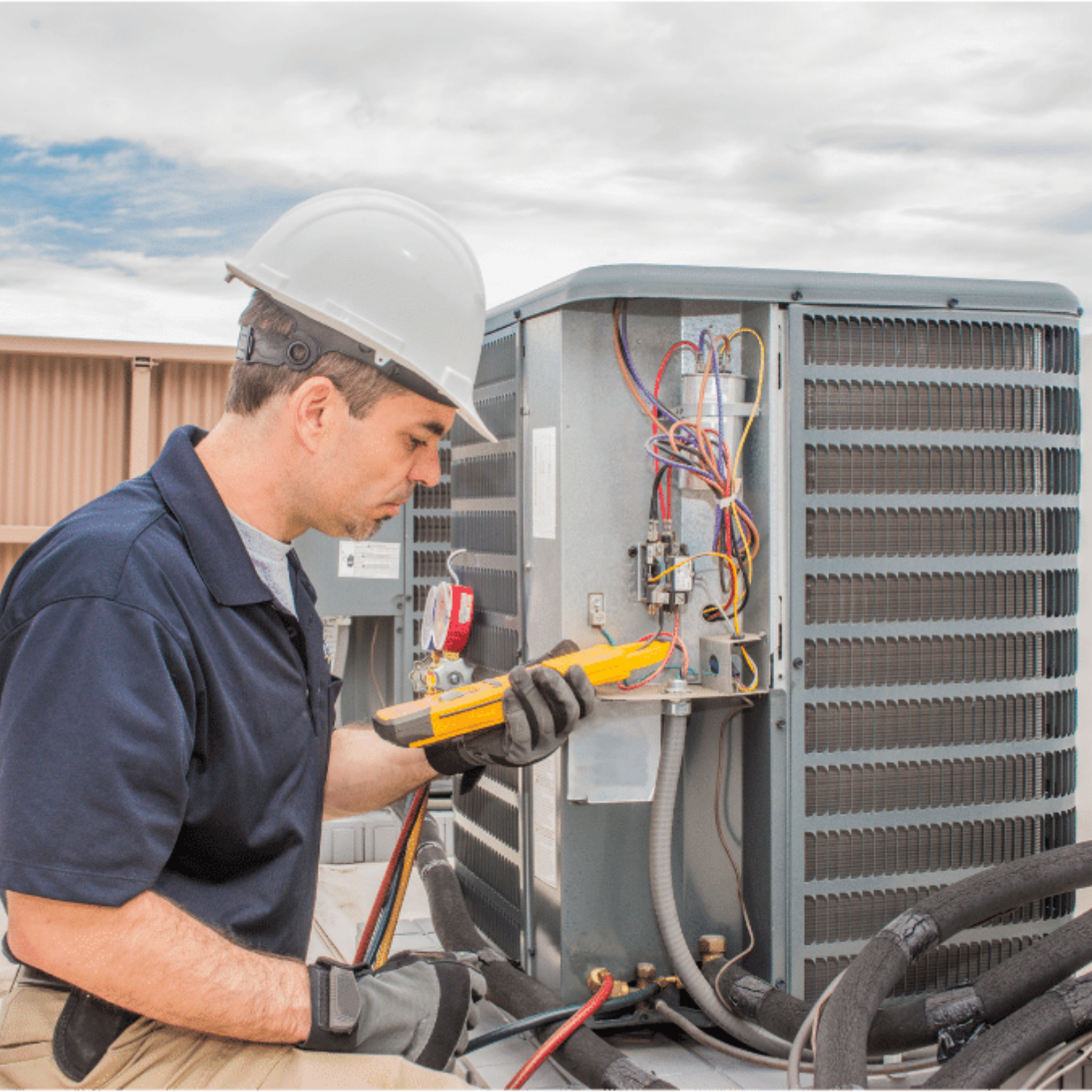 Kitchener Furnace Repair HVAC technician servicing a system